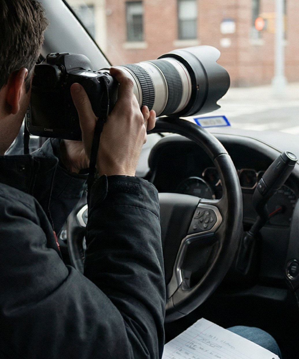 San Diego private investigators with surveillance equipment documenting claimant activity against an urban and coastal San Diego backdrop for insurance defense and workers’ compensation investigation